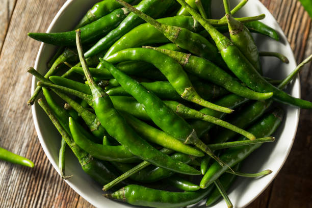istock Raw Green Organic  Thai Peppers 1204485524
