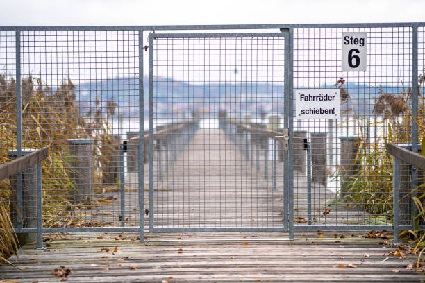 istock Gates on the wooden pier 1204485673
