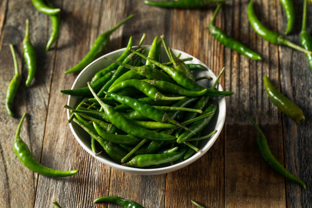 istock Raw Green Organic  Thai Peppers 1204485696