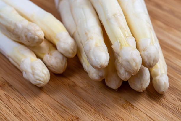 istock Fresh raw organic white asparagus vegetable ready to cook 1204488395