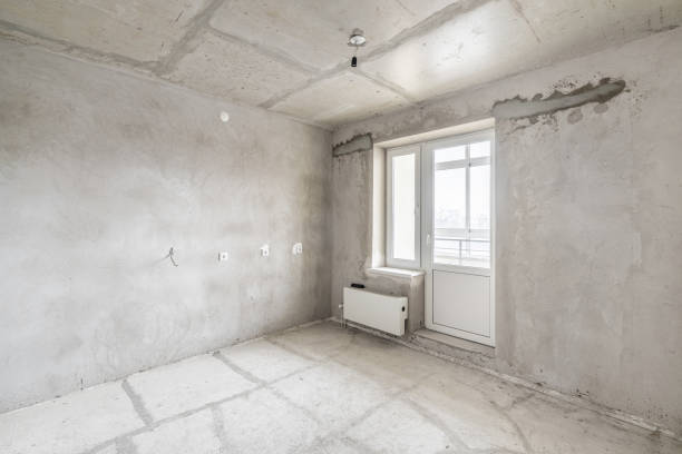 istock Kitchen. Empty interior for design, gray concrete wall. Empty room. Space for text and picture. Concrete walls, slabs, interior of a new residential building. Partitions in a new apartment 1204489233
