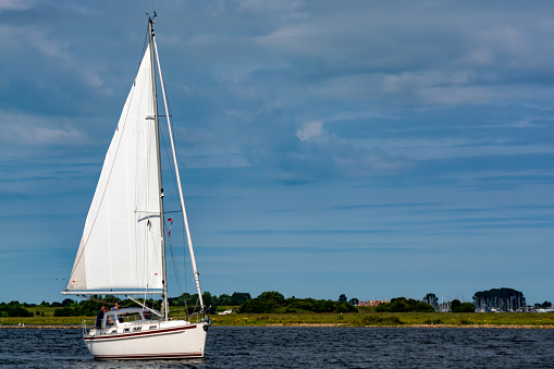 Weekend sailing on small jacht boat on riviers and canals in Kaag, South Holland, Netherlands