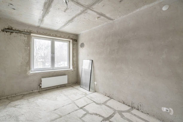 istock Empty interior for design, gray concrete wall. Empty room. Space for text and picture. Concrete walls, slabs, interior of a new residential building. Partitions in a new apartment. 1204489667