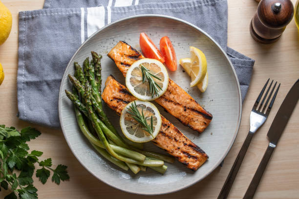istock grilled salmon fillet on plate with asparagus 1204489752