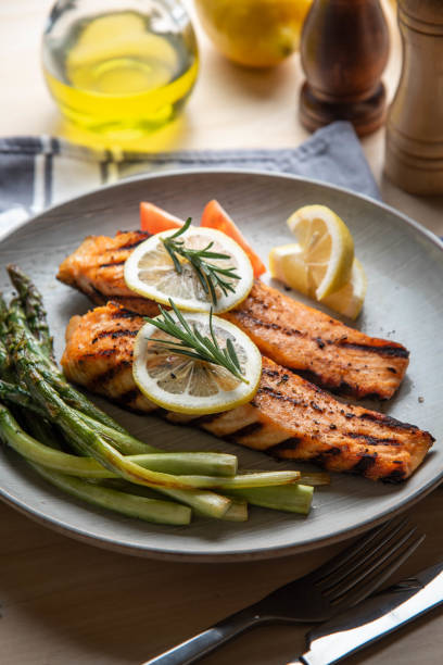 istock grilled salmon fillet on plate with asparagus 1204490294