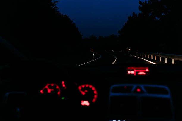 istock inside view from the car of a cloudy sunset while driving. winter season 1204495847
