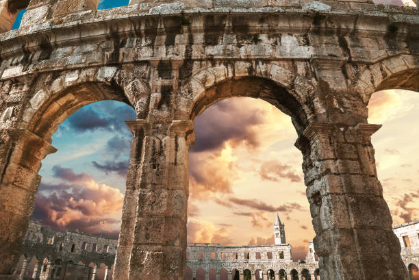 istock View on church bell tower through amphitheater arches 1204497985