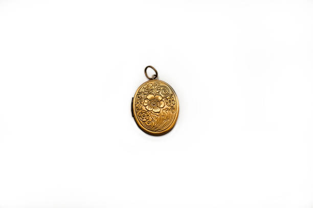 istock vintage grandma's bronze locket isolated on a white background 1204498239