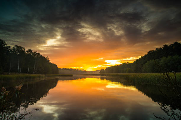 istock Sunrise on the lake. High resolution nature landscape. 1204499087