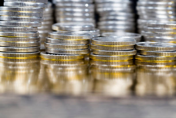 istock pile of silver coins 1204500169