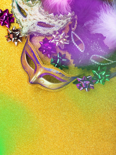 istock Colorful mardi gras carnival masks on golden 1204502192