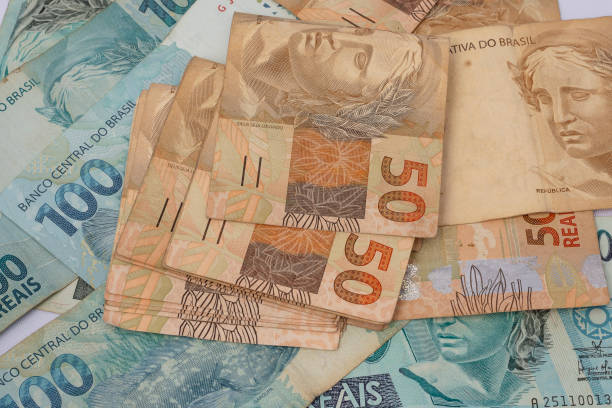 istock Brazilian money banknotes 1204502550