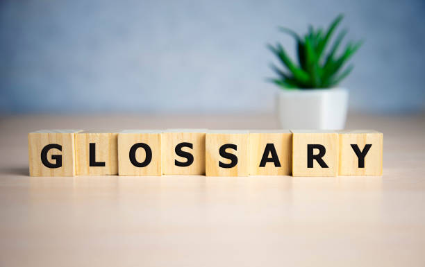 istock Glossary word made of square letter word on blue background 1204505965