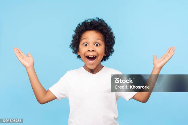No Way I Cant Believe Portrait Of Funny Amazed Preschool Boy Keeping Hands Up In Astonishment Stock Photo - Download Image Now