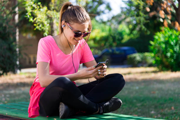istock A woman uses a free internet network with her phone. 1204507508