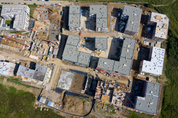 istock New Apartment Buildins and Construction Site, Aerial View 1204507595