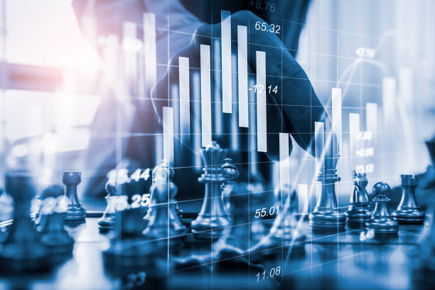 istock Chess game on chess board on stock market or forex trading graph chart for financial investment concept. Economy trends for digital business marketing strategy analysis. Abstract finance background. 1204508728
