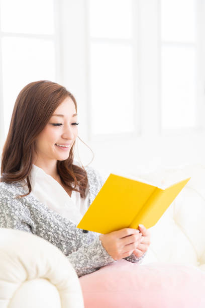 istock asian woman who reads a book 1204515942