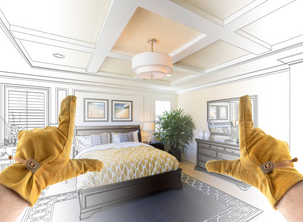 istock Male Contractor Hands Framing Completed Section of Custom Master Bedroom Design Drawing 1204515963