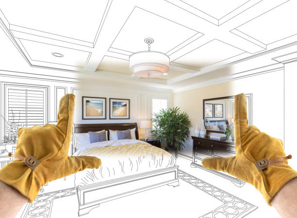 istock Male Contractor Hands Framing Completed Section of Custom Master Bedroom Design Drawing 1204515966