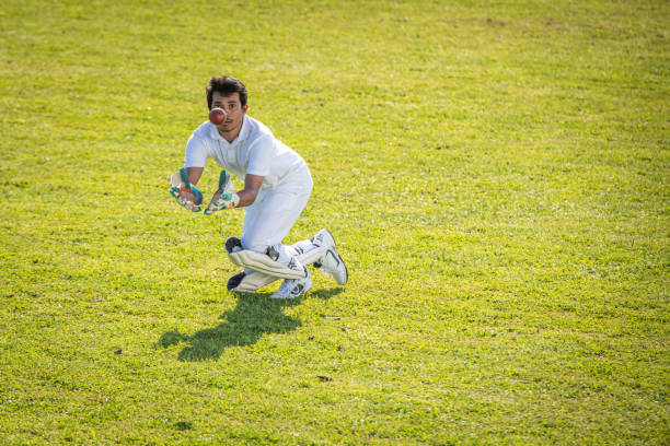 istock Indian cricket player moments before catching the ball 1204517953