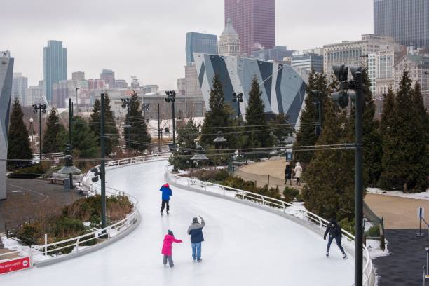 Maggie Daley Park Ice Skating Ribbon in downtown Chicago, IL, USA January 27, 2020 - Chicago, IL, USA:  Maggie Daley Park Ice Skating Ribbon is a seasonal public ice skating surface in the Maggie Daley Park section of Grant Park in the Loop community area of Chicago. millennium park chicago stock pictures, royalty-free photos & images