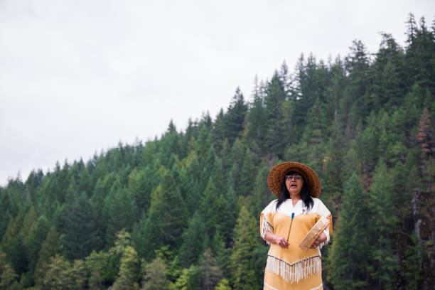 istock First Nations Women in Traditional Clothing singing and dancing 1204530519