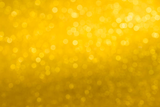 istock gold colorful defocused background with festive light bokeh 1204531062