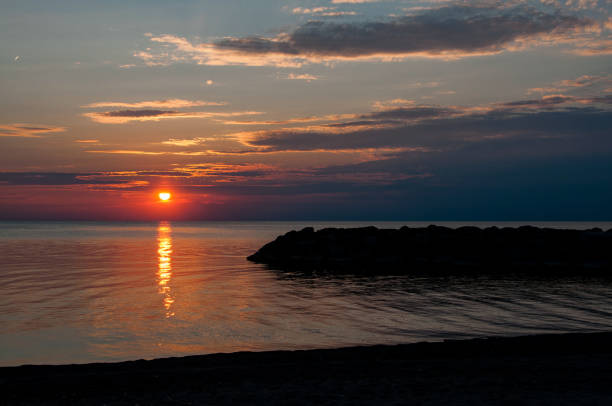 istock Presque Isle Sunset Over Lake Erie 1204531557