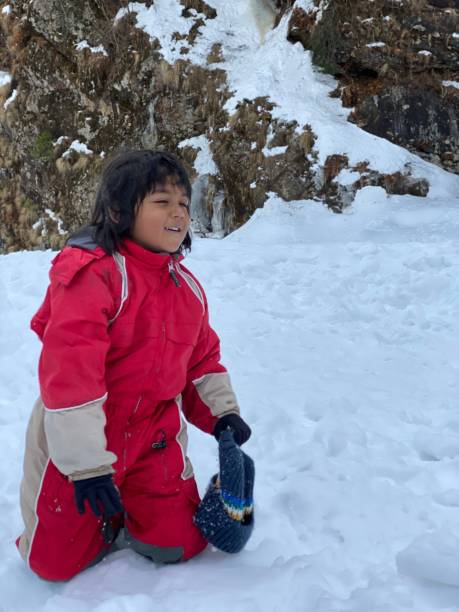 istock Young Boy has fun in the Snow. 1204539884