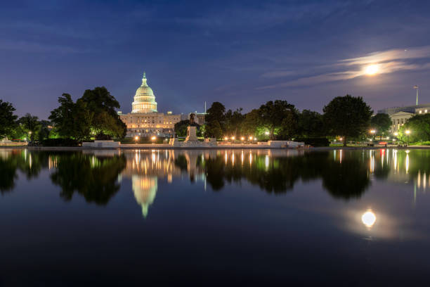 istock The United States Capitol at night 1204540571