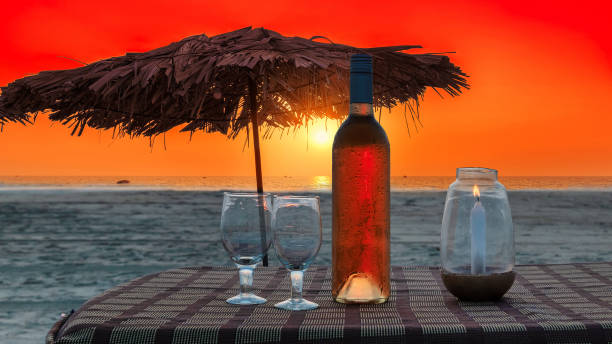 beach party at sunset - summer party drink umbrella concepts imagens e fotografias de stock