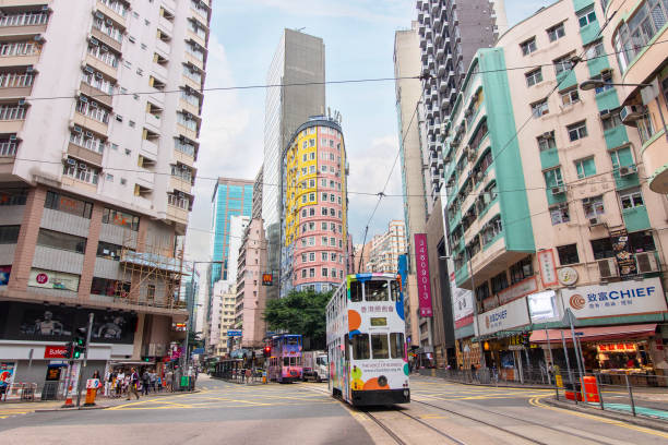 istock Hong Kong street scene in Wan Chai tramway path 1204542384