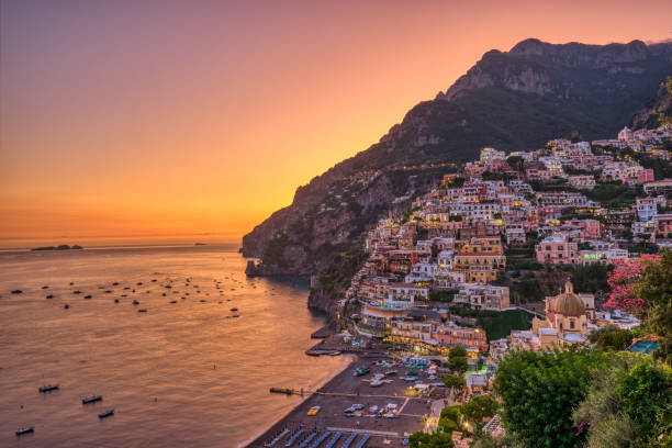 The famous village of Positano on the italian Amalfi coast The famous village of Positano on the italian Amalfi coast after sunset sorrento italy photos stock pictures, royalty-free photos & images