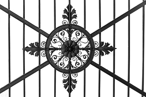 Wrought iron gate isolated against white background