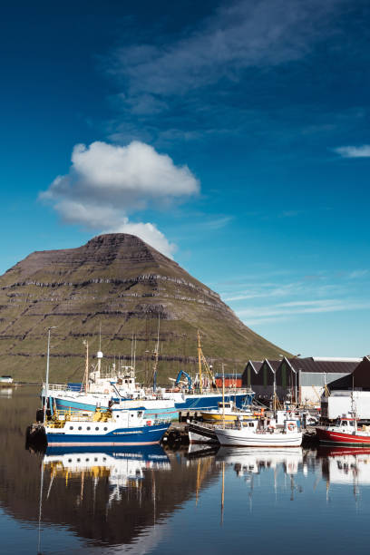 istock reflections of village at Faroe Islands 1204548821