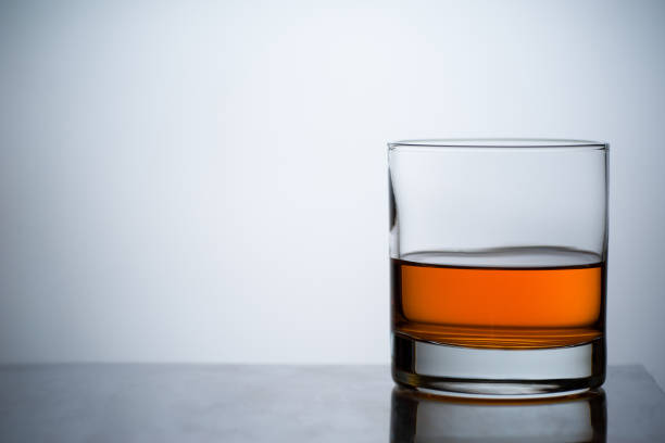 istock Whiskey in a glass with ice. 1204550438