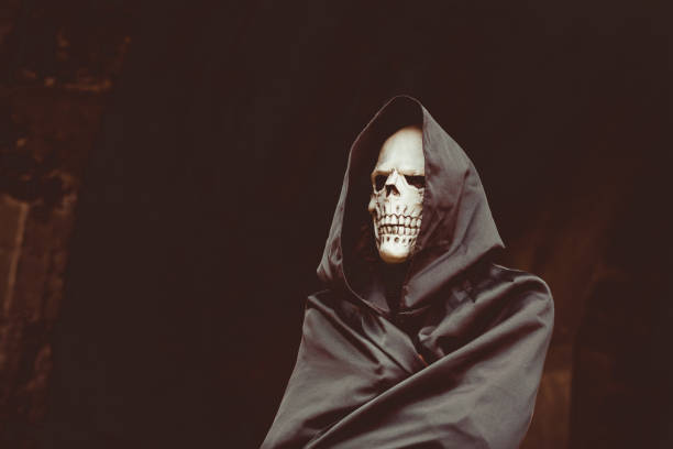 istock death in the black cloak 1204556508