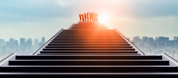 Success of business concept. Group of businessperson on the top of stairs. Success of business concept. Group of businessperson on the top of stairs. elite stock pictures, royalty-free photos & images