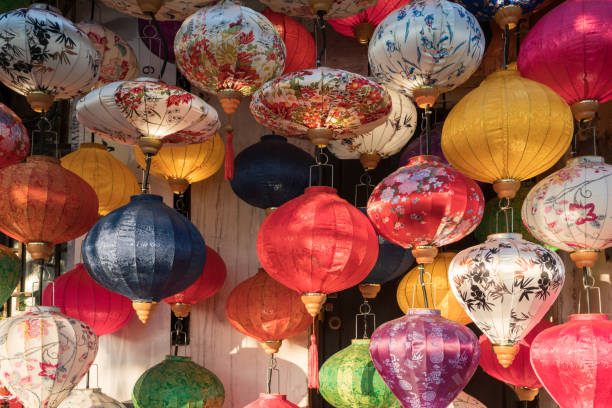 istock Colorful lanterns hang on the wall 1204562291