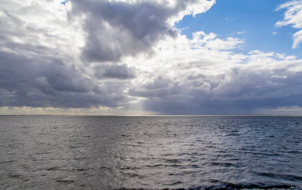 istock dramatic illuminated coastal scenery in Eastern Frisia 1204563463