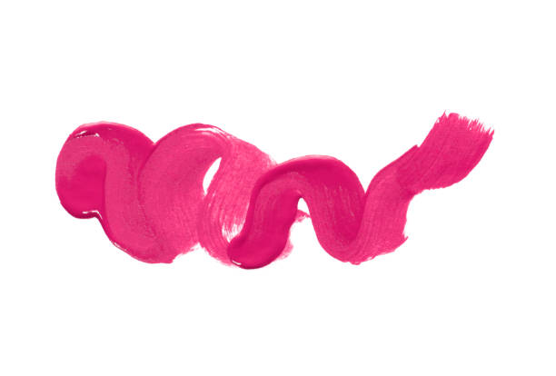 istock Smear of liquid pink lipstick isolated on white background. 1204564156