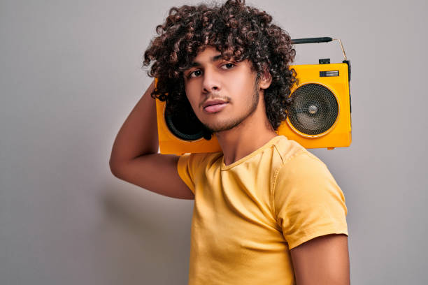 istock Eastern young man music listener 1204565810