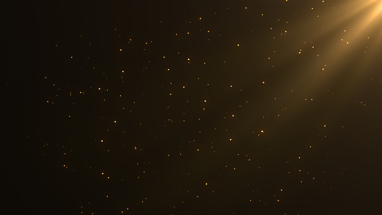 Abstract background beautyful gold particles with shining golden Floating Dust Particles Flare Bokeh star on Black Background in Slow Motion. Futuristic glittering fly movement flickering in space.