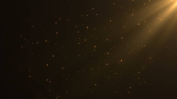 абстрактный фон косметических частиц золота с блестящими золот�ыми плавающими частицами пыли flare. - animation стоковые фото и изображения