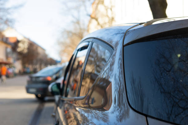 istock Cars in the parking lot 1204574376