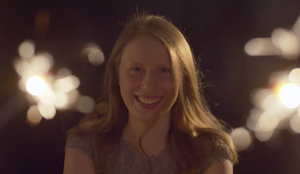 istock Blond smiling lady on the party 1204580120