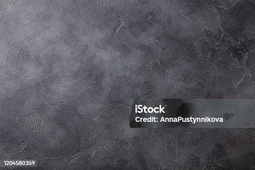 istock Natural black slate stone background pattern with high resolution. Top view. Copy space. 1204580359