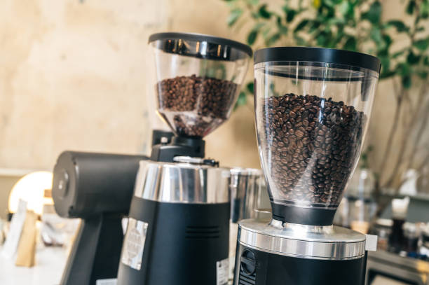 istock Professional coffee blender machine in cafe with cafe decoration in background 1204580571