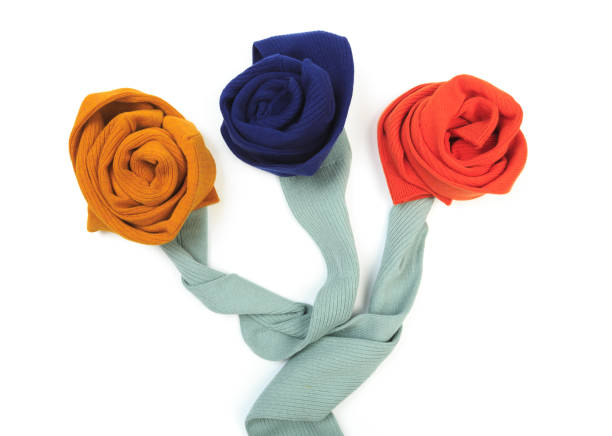 istock colorful socks isolated on white  flower shaped 1204580723
